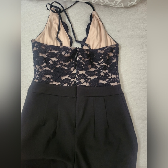 Express Black Jumpsuit with Elegant Lace Detailing - Picture 9 of 16